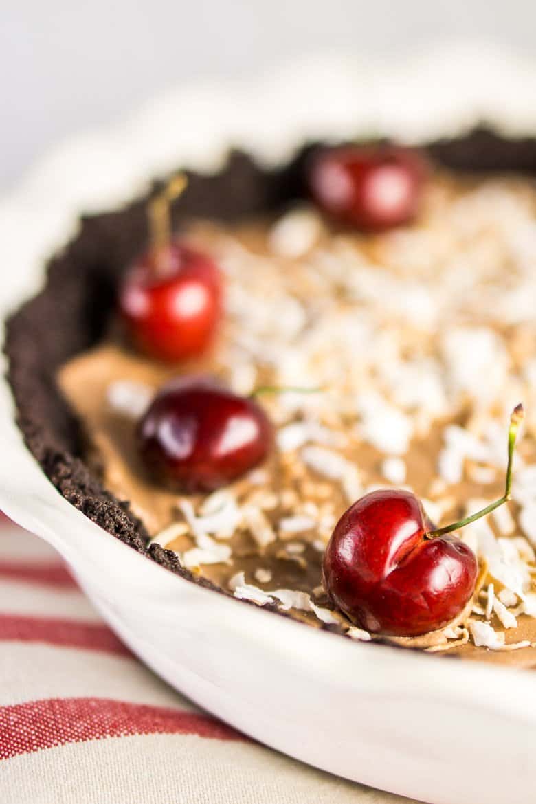 The frozen chocolate mousse pie on a red and white napkin.