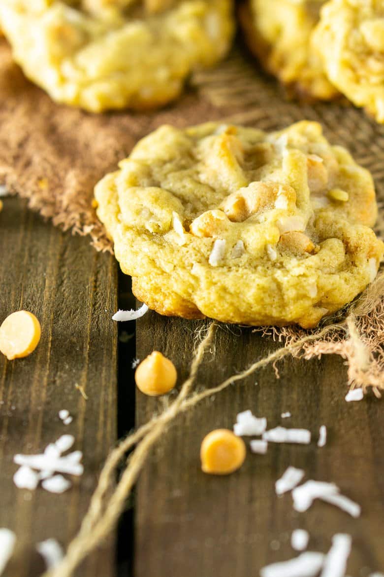 A close-up of the butterscotch-coconut-bourbon cookie on burlap. 