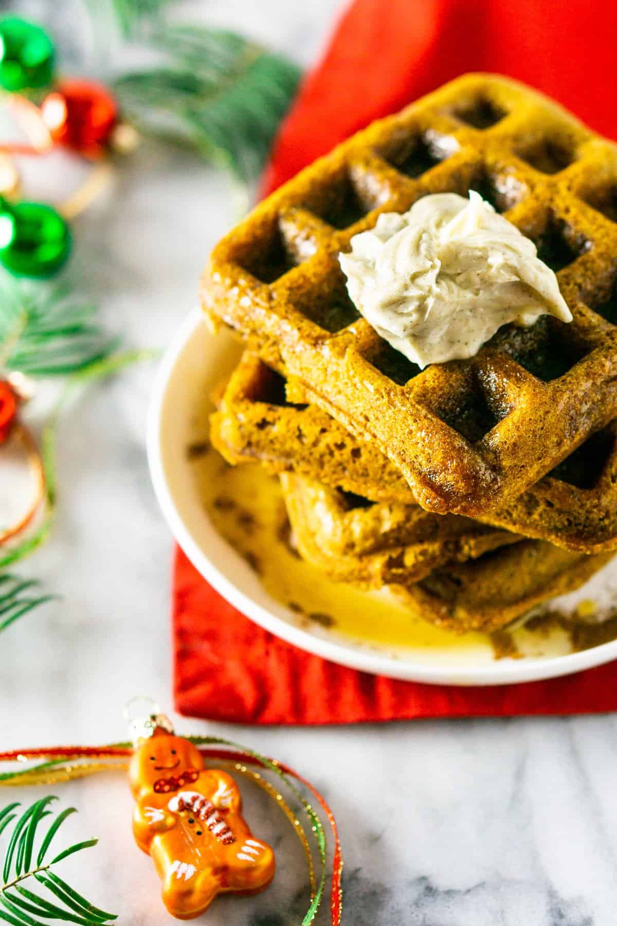 A stack of gingerbread waffles from the top down.