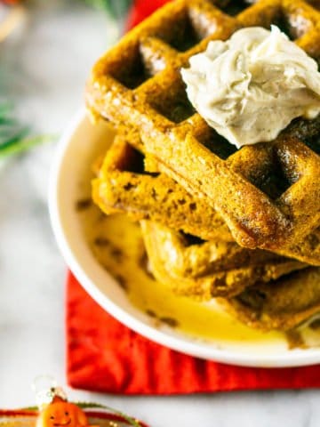 A stack of gingerbread waffles from the top down.