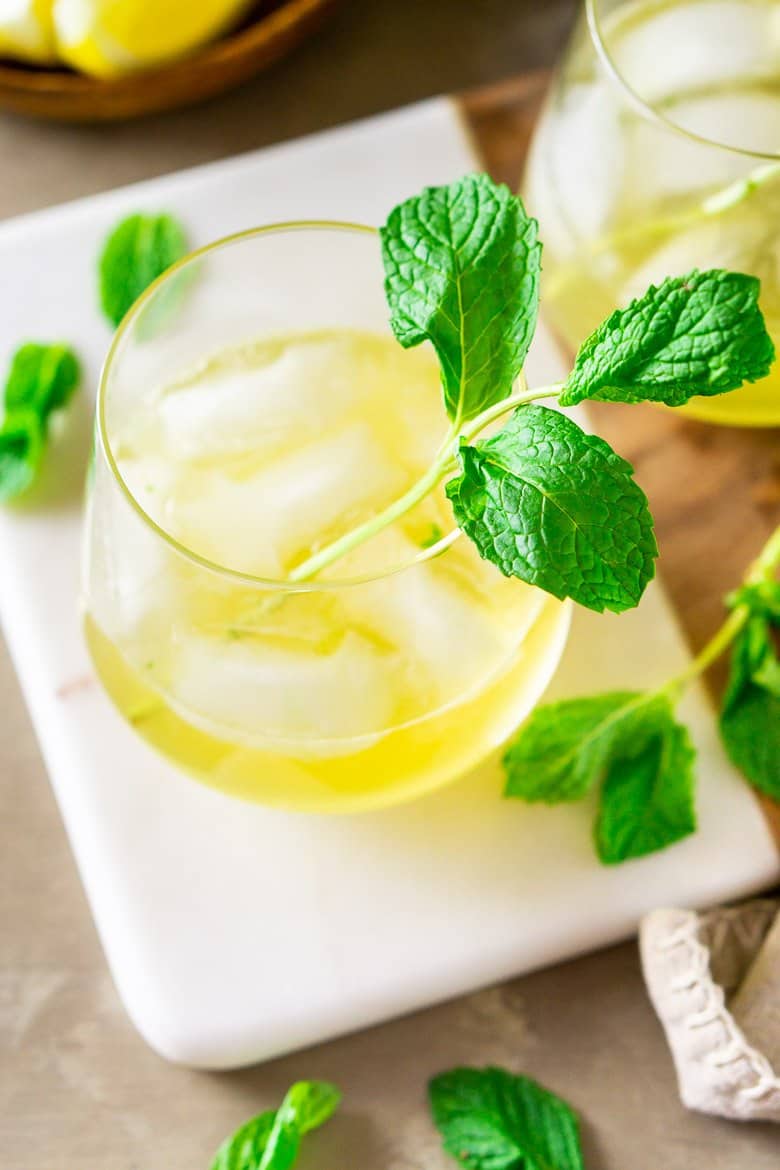 An aerial view of a single Irish whiskey smash with fresh mint.