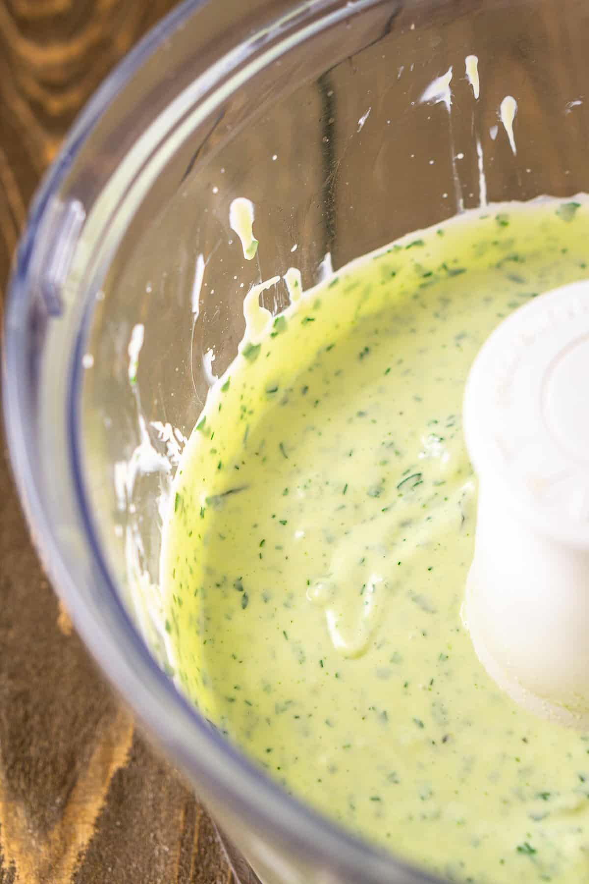 A food processor with the creamy herbed dressing.