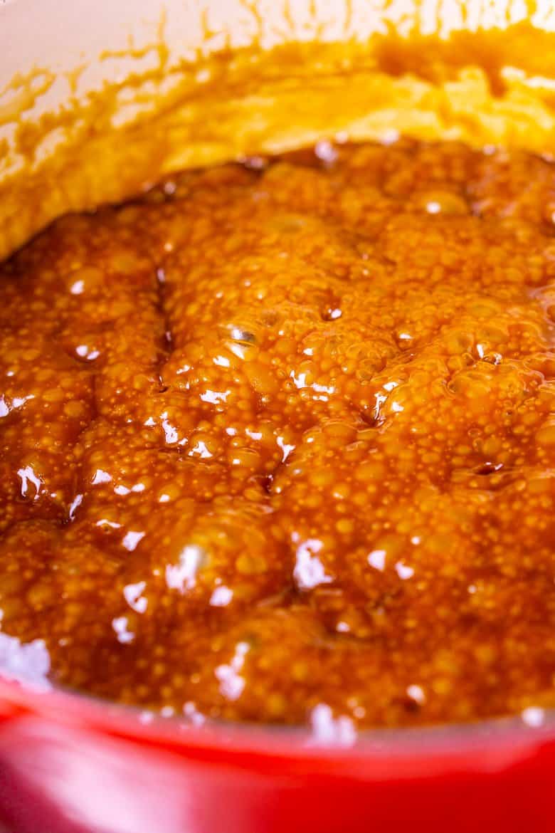 The gingerbread toffee after it's come to a roiling boil and has darkened and reduced.