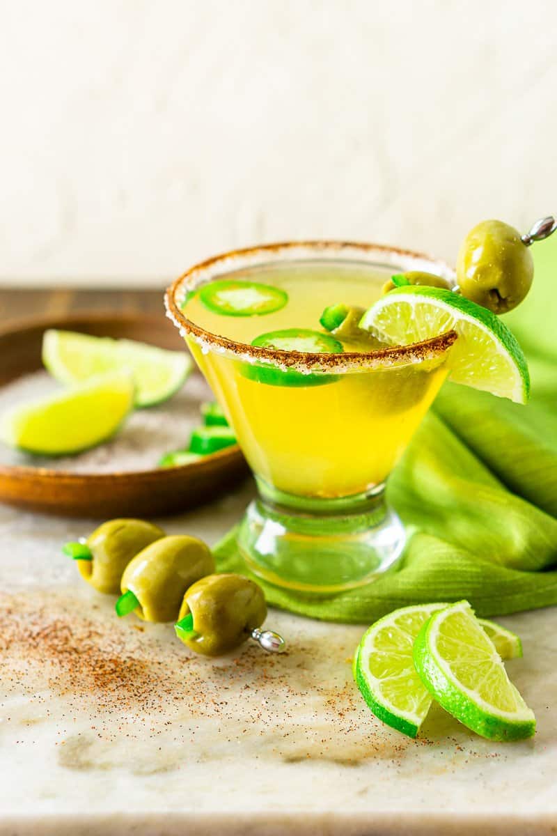 The cocktail on a marble platter against a cream-colored background.