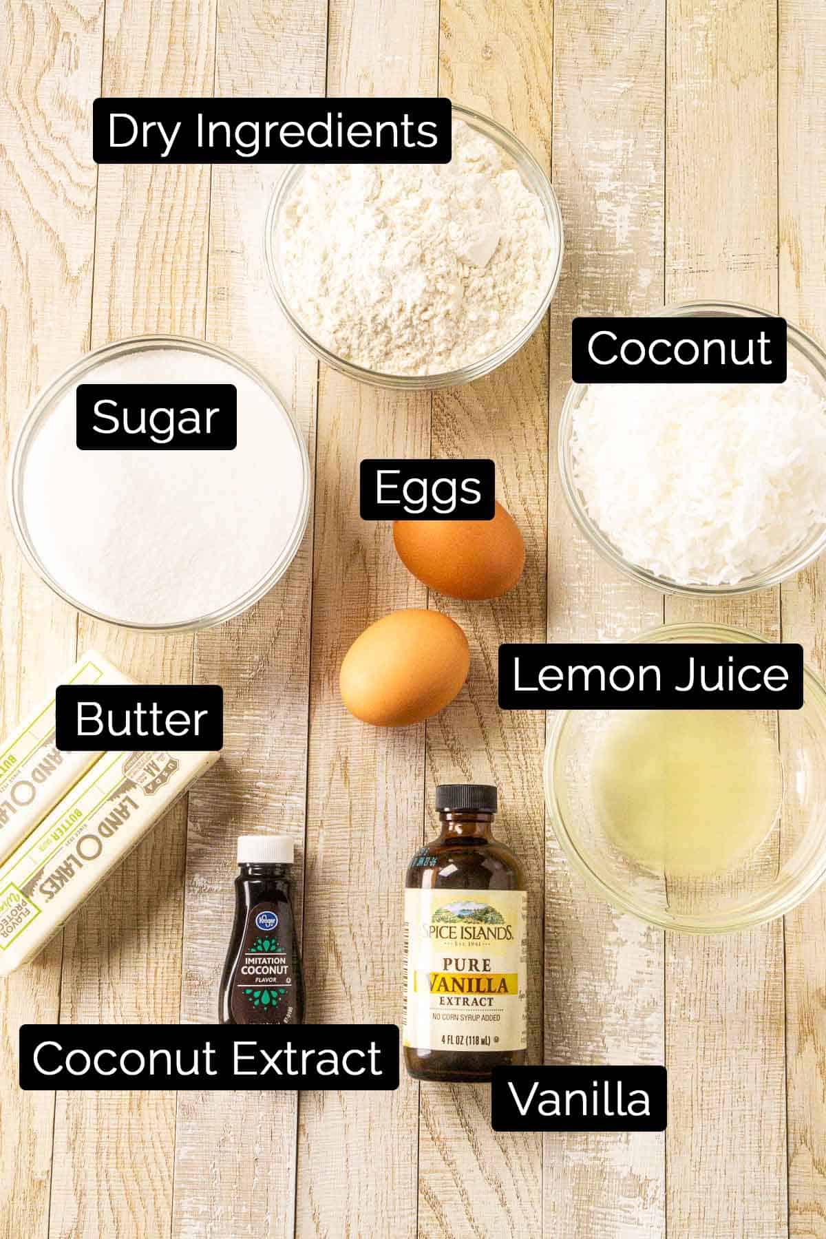 The coconut sugar cookie ingredients with labels on a lightly colored board.