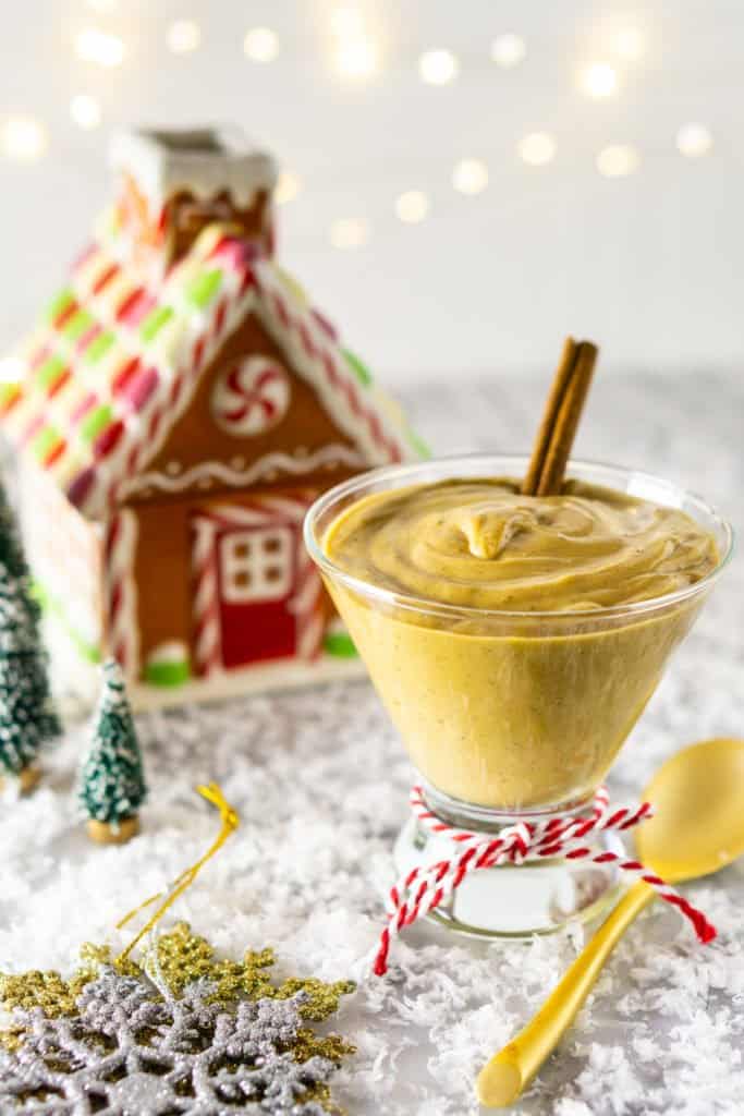 Side view of the gingerbread pudding with a gingerbread house. 