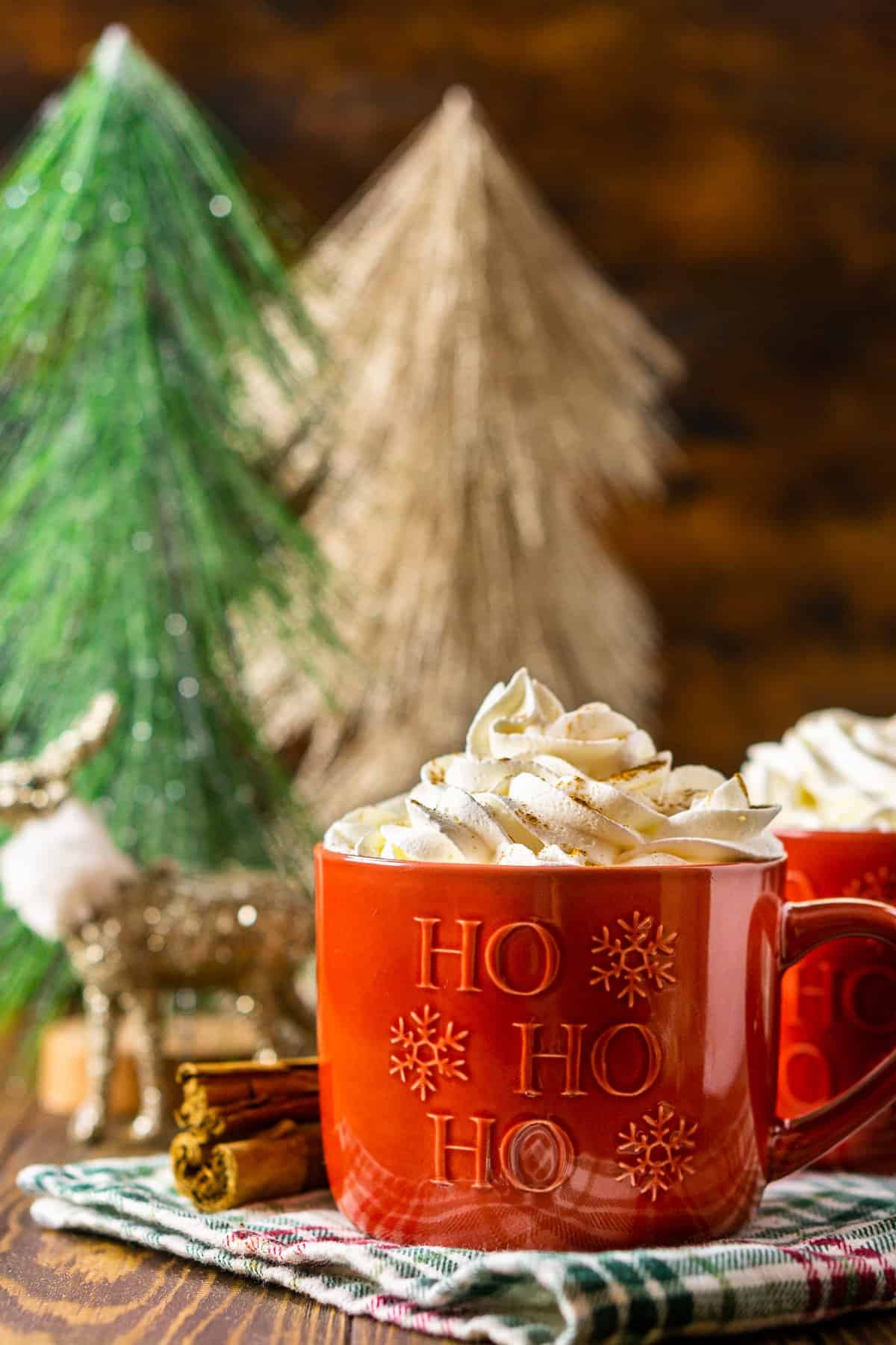 A straight-on shot of the gingerbread latte on a festive towel.