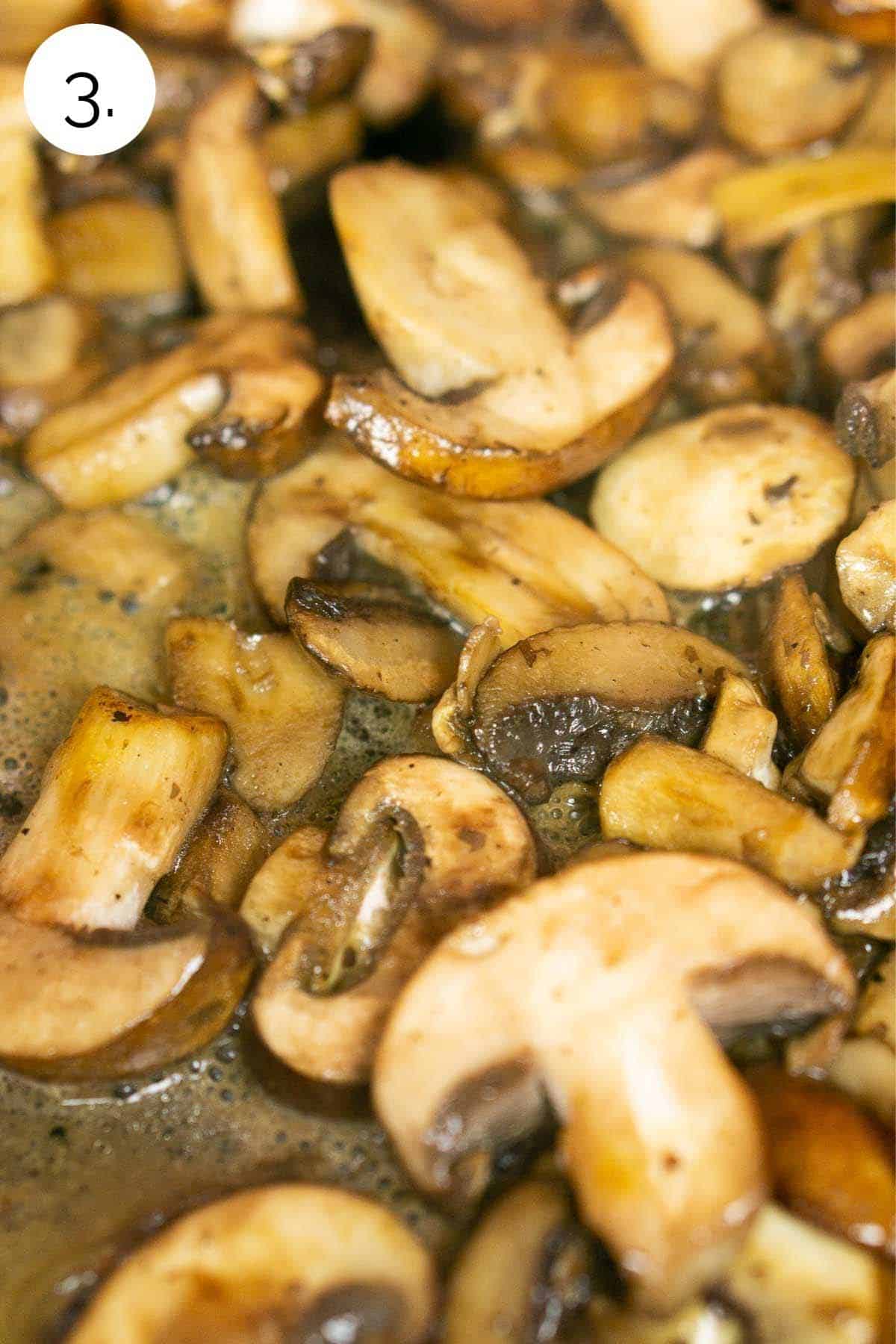 Brown sliced mushrooms in a skillet with butter.