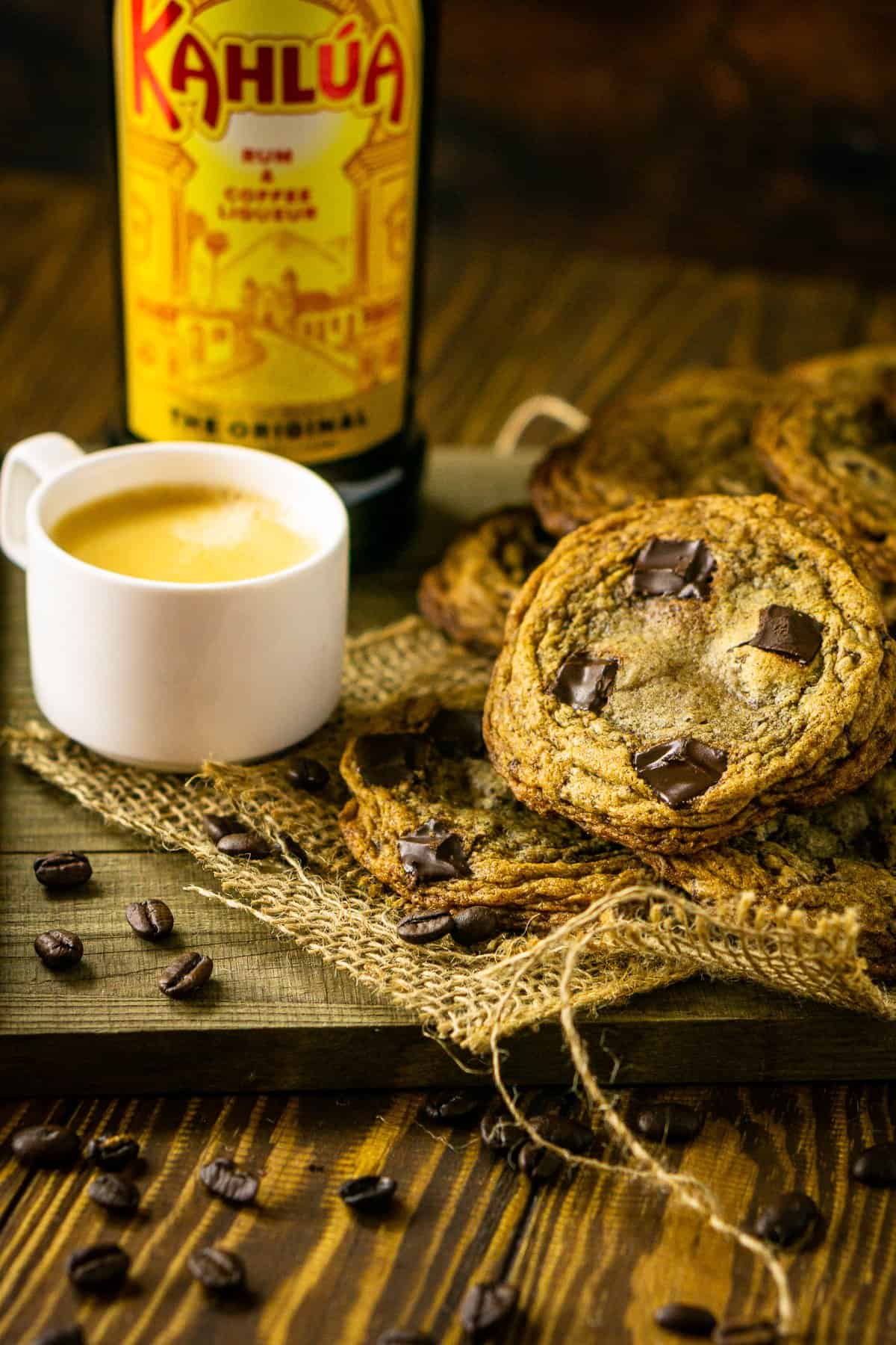 The espresso and Kahlua cookies on a wooden tray with burlap.