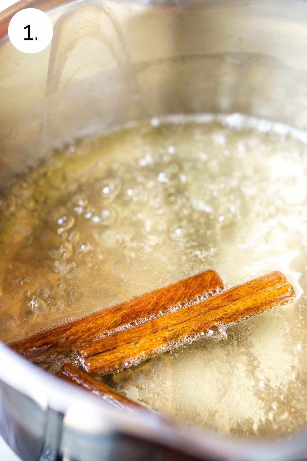 Bringing the cinnamon simple syrup to a boil in a small saucepan.