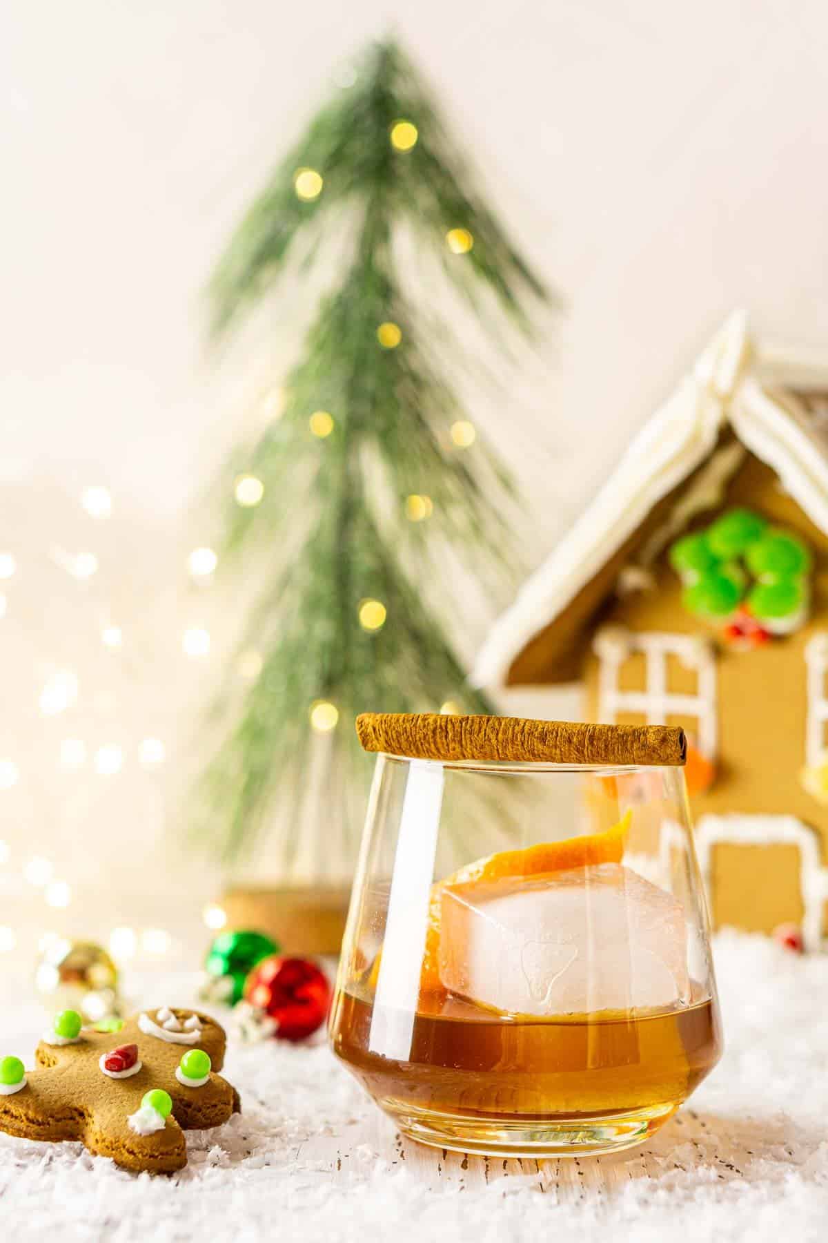 A close-up of the gingerbread fashioned with sparkling lights behind it.
