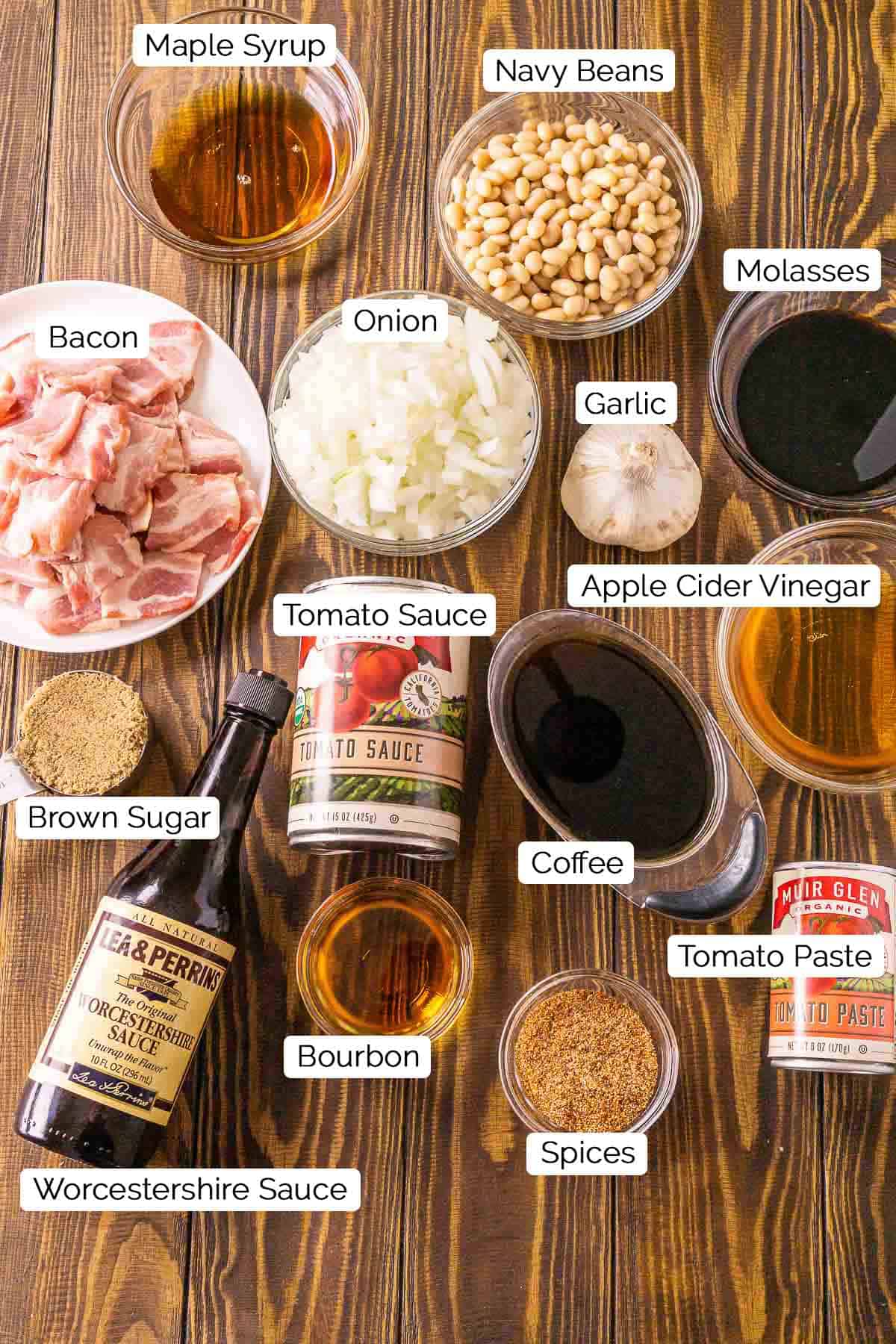 The ingredients on a wooden board with black and white labels identifying each item.
