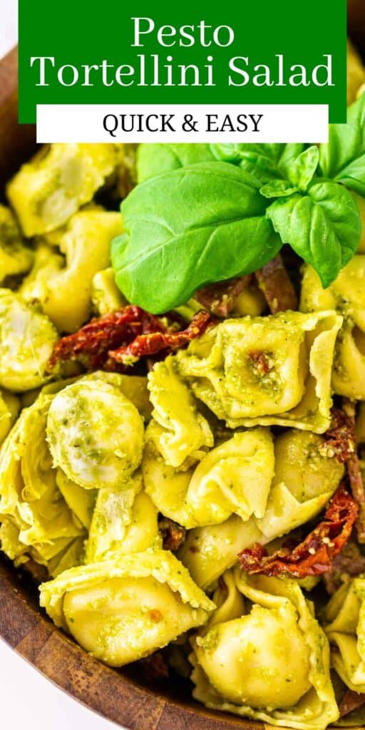 A bowl of pesto tortellini salad with text overlay on top of the image.