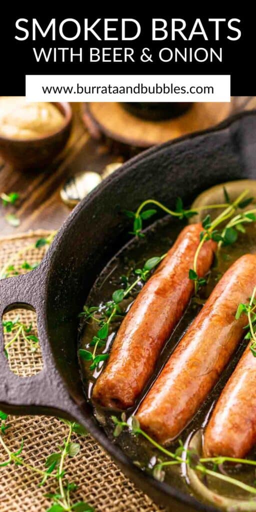 The smoked brats in a black cast-iron skillet with sprigs of thyme in front and text overlay on top of the image.