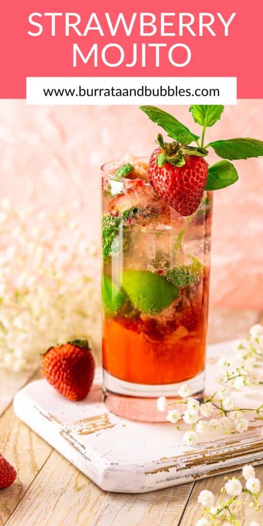 A strawberry mojito on a white wooden tray with flowers to the side and text overlay on top of the image.