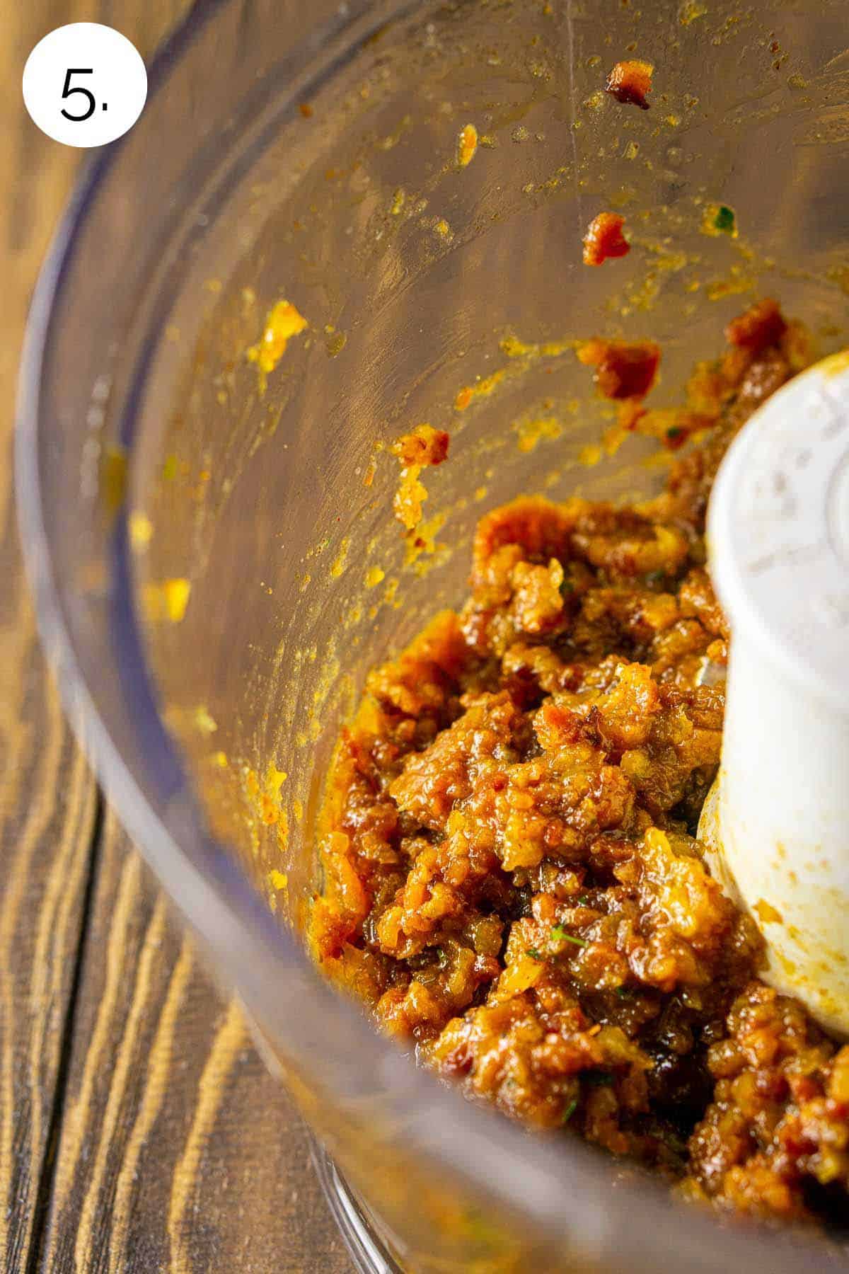 The bacon jam in a food processor after it's been blended to reach the proper consistency for serving.