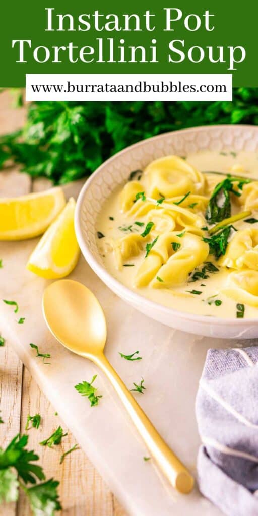 A bowl of Instant Pot tortellini soup on a white marble tray with a gold spoon and lemon slices to the side and fresh parsley scattered around it and text overlay on top.