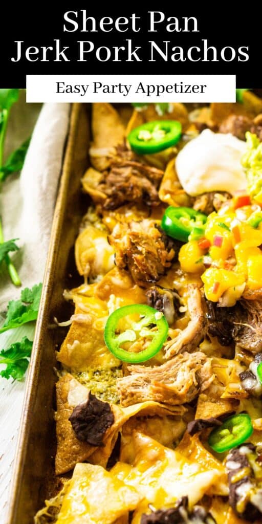 A sheet pan filled with jerk pork nachos with fresh cilantro to the side and text overlay on top.