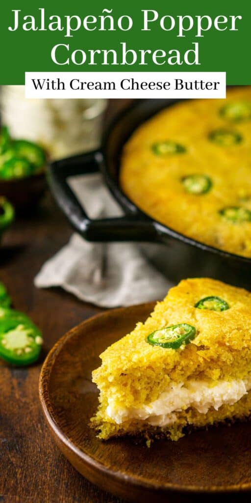 A slice of jalapeno popper cornbread on a small brown wooden plate with text overlay on top of the image.